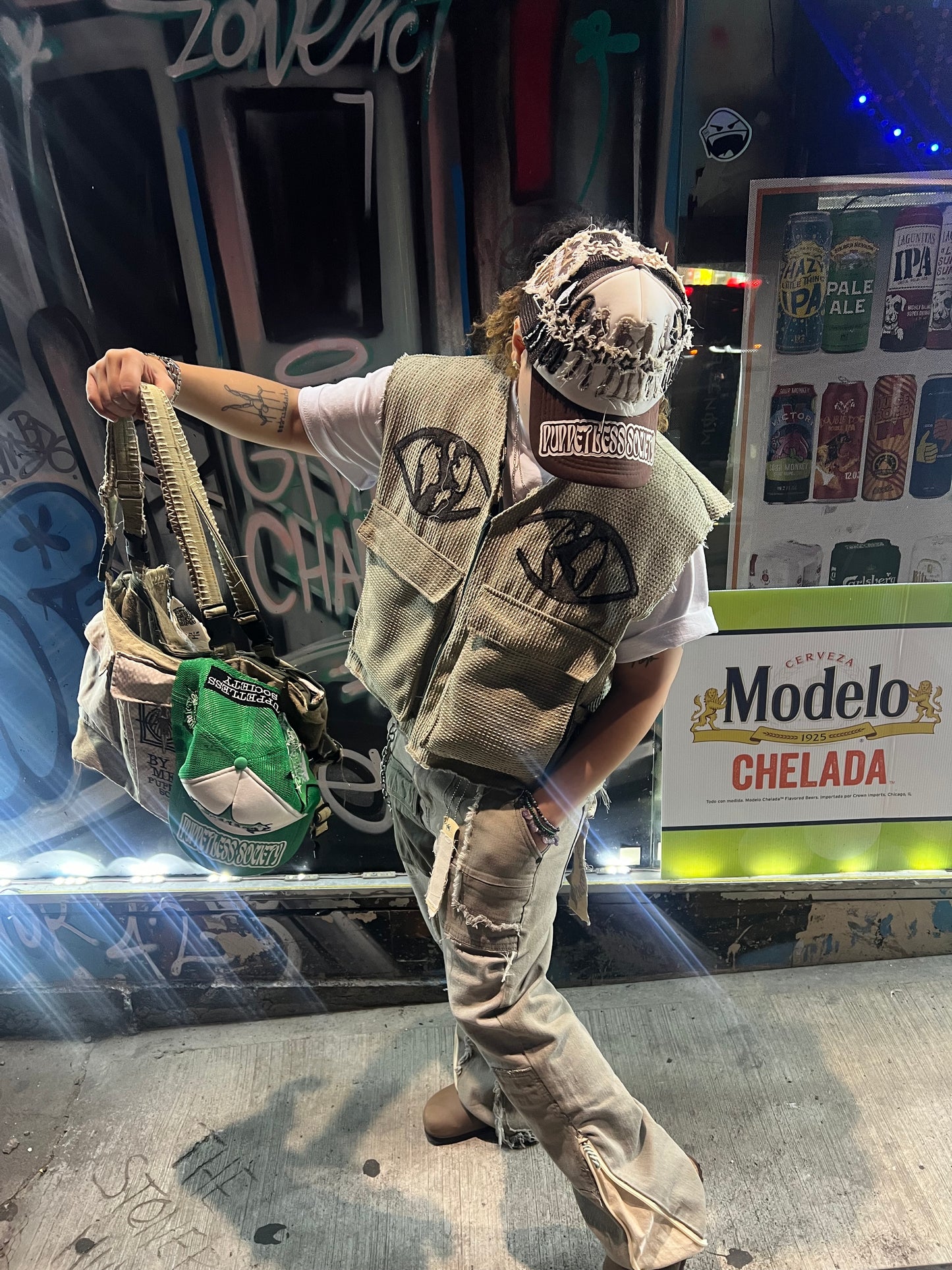 Cropped and baggy green vest