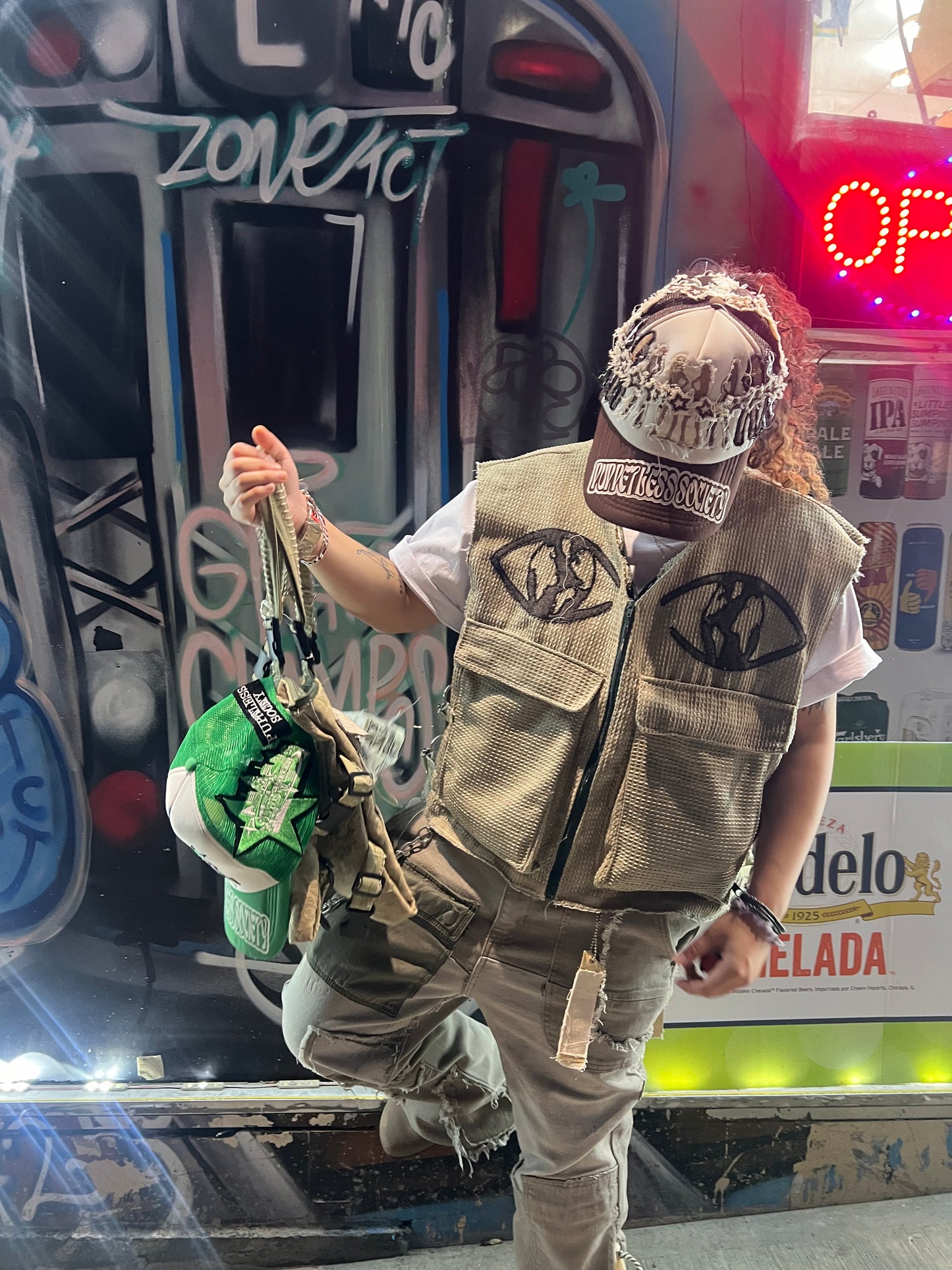 Cropped and baggy green vest