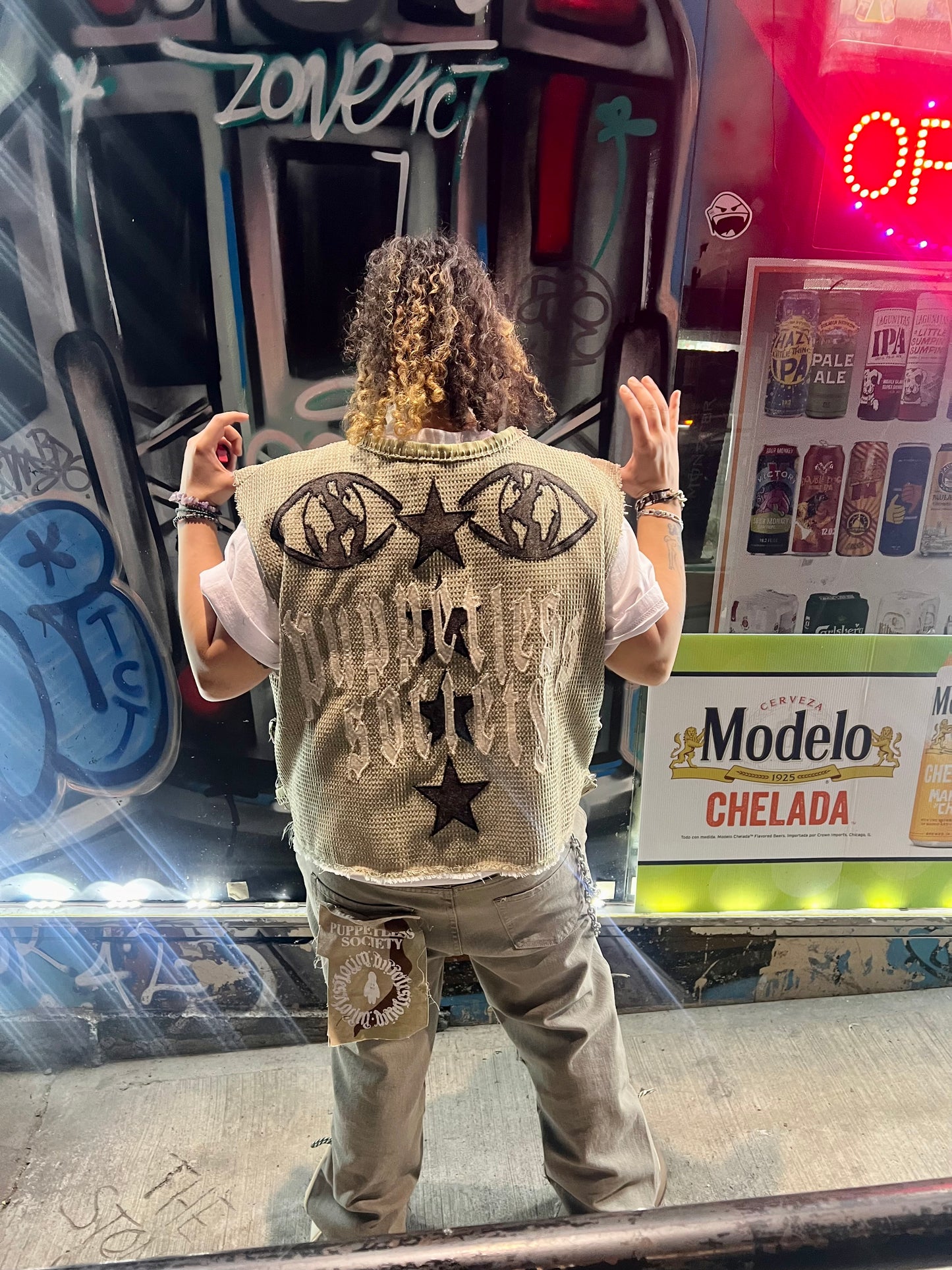 Cropped and baggy green vest