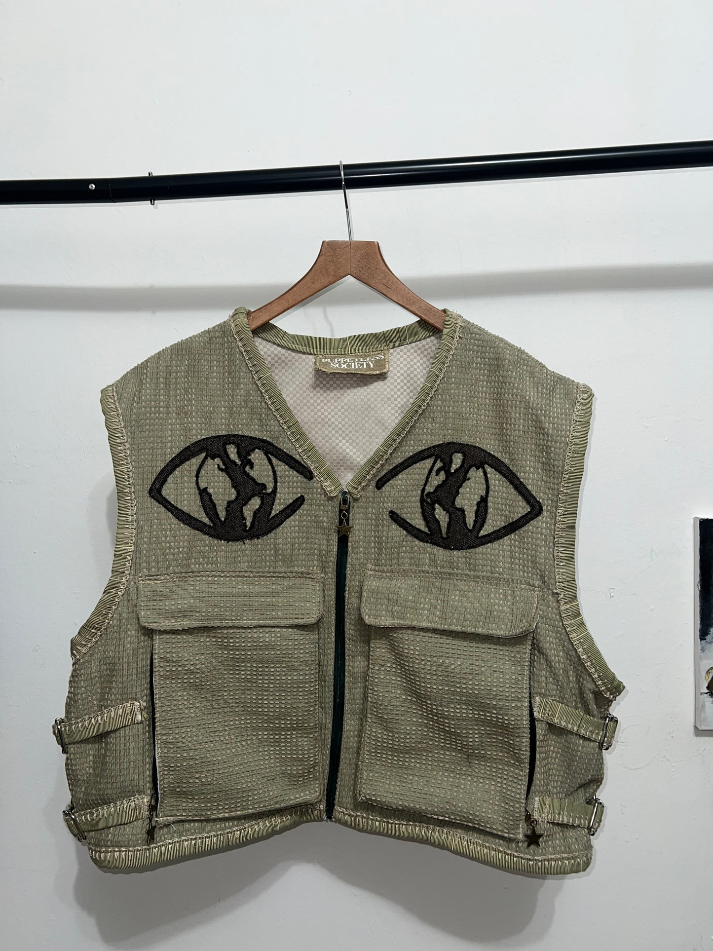 Cropped and baggy green vest