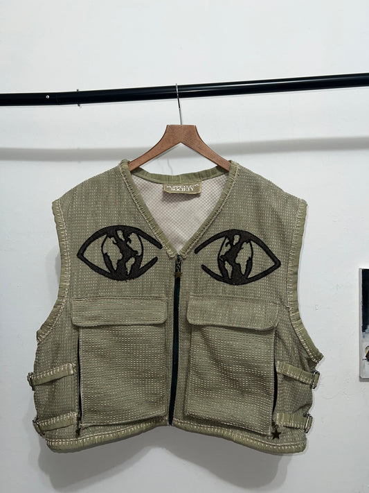 Cropped and baggy green vest